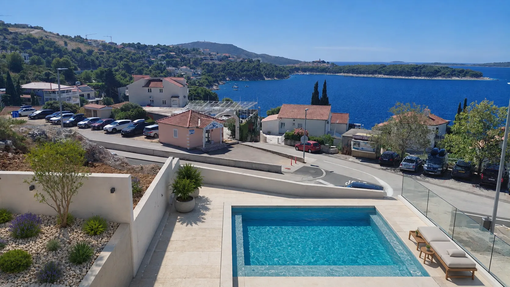 The bay and the open Adriatic seen from a Mirna Luka pool terrace in Primošten.
