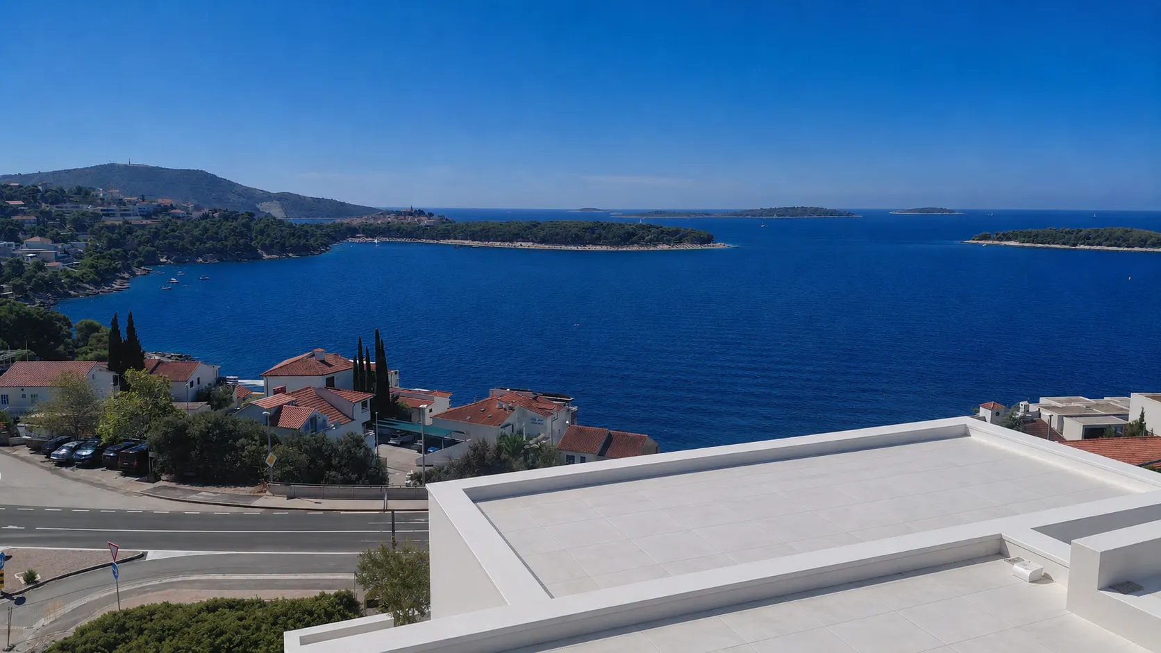 Open Adriatic and the offshore islands from a Mirna Luka rooftop terrace.
